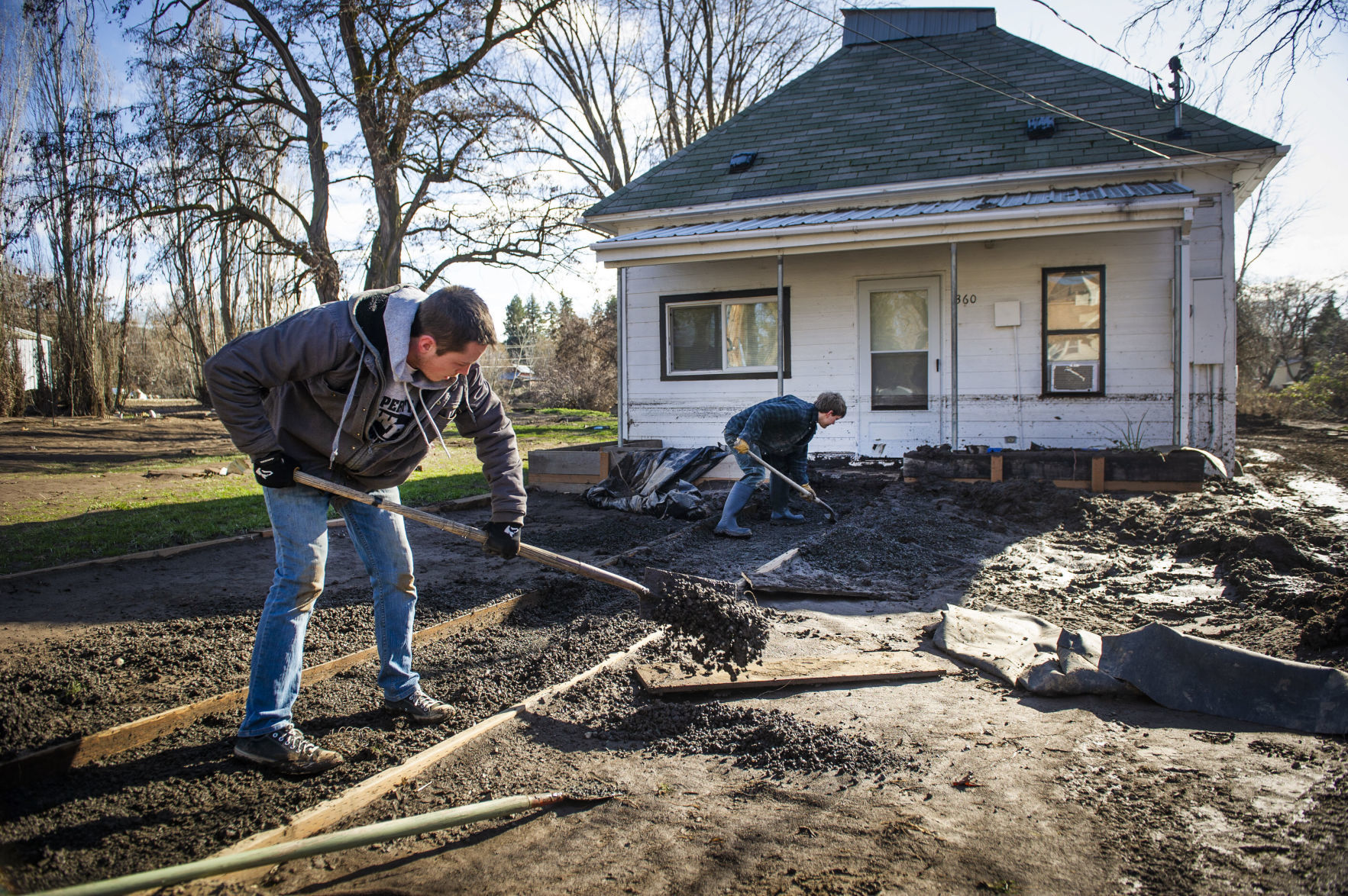 Volunteers scouring the community with shovels
